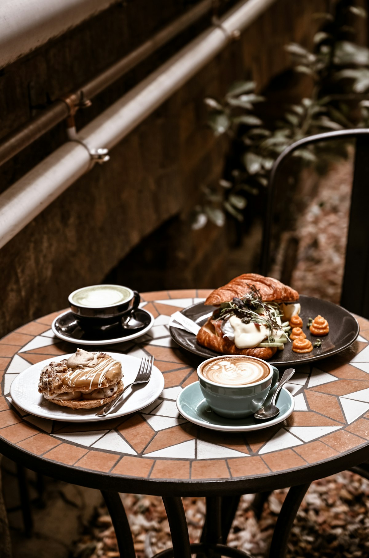 Coffee and pastries on a café table
